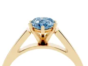 Fancy Blue Pear Cut Diamond Solitaire Engagement Ring Set in Yellow gold with Prong Setting and Tapered Band