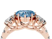 Fancy Blue Heart Cut Diamond Three-Stone Ring Set in Rose gold with Pavé Band