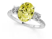Fancy Yellow Oval Cut Diamond Three-Stone Ring Set in Silver with Pavé Band and Graduated Sides