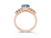 Fancy Blue Heart Cut Diamond Cluster Engagement Ring Set in Rose gold with Pavé Band and Prong Setting