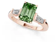 Fancy Green Emerald Cut Diamond Solitaire Ring Set in Rose gold with Tapered Baguette Accents and Prong Setting
