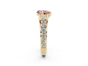 Fancy Pink Pear Cut Diamond Pavé Engagement Ring Set in Yellow gold with Prong Setting