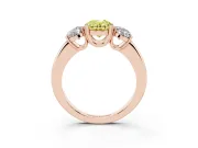 Fancy Yellow Oval Cut Diamond Three-Stone Ring Set in Rose gold with Polished Band and Prong Setting