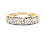 Princess Cut Diamond Seven-Stone Channel Band Set in Yellow gold with Bar Prongs