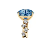 Fancy Blue Round Cut Diamond Cluster Solitaire Ring Set in Yellow gold with Prong Setting