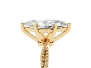 Marquise Cut Diamond Solitaire Ring Set in Yellow gold with Twisted Band and Bead Prong Setting