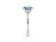 Fancy Blue Oval Cut Diamond Solitaire Ring Set in White gold with Prong Setting on a Plain Round Band