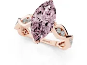 Fancy Pink Marquise Cut Diamond Twist Band Solitaire Ring Set in Rose gold with Leaf Prong Setting and Accent Stones