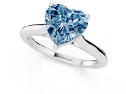 Fancy Blue Heart Cut Diamond Solitaire Ring Set in White gold with Cathedral Band and Prong Setting