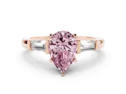 Fancy Pink Pear Cut Diamond Solitaire Ring Set in Rose gold with Tapered Baguette Accents and Prong Setting
