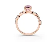 Fancy Pink Emerald Cut Diamond Solitaire Ring Set in Rose gold with Twisted Marquise Accent Band