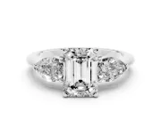 Three-Stone Emerald Cut Diamond Ring Set in Silver with Pear Side Stones and Prong Setting