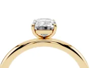 Emerald Cut Diamond Solitaire Ring Set in Yellow gold with Prong Setting on a Polished Plain Band