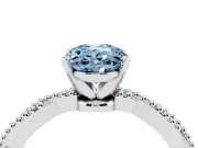 Fancy Blue Oval Cut Diamond Solitaire Ring Set in Platinum with Twisted Band and Bead Prong Setting