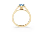 Fancy Blue Pear Cut Diamond Solitaire Engagement Ring Set in Yellow gold with Prong Setting and Tapered Band