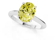 Fancy Yellow Oval Cut Diamond Solitaire Ring Set in White gold with Prong Setting on a Plain Round Band