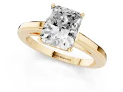 Radiant Cut Diamond Solitaire Ring Set in Yellow gold with Prong Setting and Classic Band