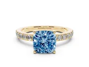 Fancy Blue Cushion Cut Diamond Solitaire Set in Yellow gold with Round Pavé Band and Prong Setting
