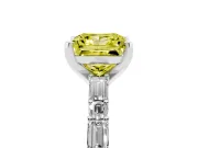 Fancy Yellow Princess Cut Diamond Solitaire Set in White gold with Side Baguettes and Channel Set Band