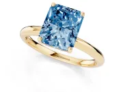 Fancy Blue Radiant Cut Diamond Solitaire Engagement Ring Set in Yellow gold with Prong Setting and Polished Band