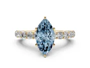 Fancy Blue Marquise Cut Diamond Solitaire Ring Set in Yellow gold with Shared Prong Pavé Band