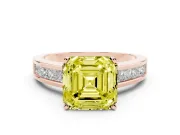 Fancy Yellow Asscher Cut Diamond Solitaire Ring Set in Rose gold with Channel-Set Band and Prong Setting