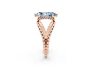 Fancy Blue Marquise Cut Diamond Halo Ring Set in Rose gold with Twisted Band and Prong Setting
