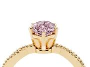 Fancy Pink Marquise Cut Diamond Solitaire Ring Set in Yellow gold with Twisted Band and Bead Prong Setting