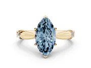 Fancy Blue Marquise Cut Diamond Solitaire Twisted Band Ring Set in Yellow gold with Accent Stones and Prong Setting