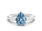 Fancy Blue Pear Cut Diamond Solitaire Ring Set in Silver with Prong Setting and Classic Band