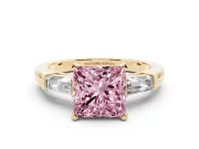 Fancy Pink Princess Cut Diamond Solitaire Ring Set in Yellow gold with Tapered Baguette Side Stones and Prong Setting