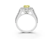 Fancy Yellow Oval Cut Diamond Halo Engagement Ring Set in White gold with Split Shank and Prong Setting
