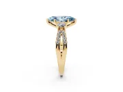 Fancy Blue Marquise Cut Diamond Three-Stone Ring Set in Yellow gold with Pavé Split Shank and Prong Setting