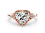 Heart Cut Diamond Milgrain Solitaire Ring Set in Rose gold with Tapered Pavé Band and Prong Setting