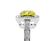 Fancy Yellow Cushion Cut Diamond Halo Pavé Engagement Ring Set in White gold with Bezel Setting