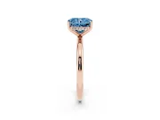 Fancy Blue Radiant Cut Diamond Solitaire Engagement Ring Set in Rose gold with Prong Setting and Polished Band