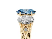 Fancy Blue Oval Cut Diamond Three-Stone Ring Set in Yellow gold with Braided Band