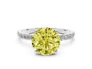 Fancy Yellow Round Cut Diamond Solitaire Engagement Ring Set in Silver with Round Pavé Band and Prong Setting