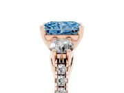 Fancy Blue Three-Stone Radiant Cut Diamond Pavé Band Ring Set in Rose gold with Prong-Set Trio