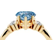Fancy Blue Three-Stone Heart Cut Diamond Channel Set Ring Set in Yellow gold with Bar Prongs