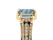 Fancy Blue Emerald Cut Diamond Pavé Split Shank Solitaire Ring Set in Yellow gold with Prong Setting