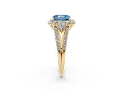 Fancy Blue Radiant Cut Diamond Halo Split Shank Engagement Ring Set in Yellow gold with Prong-Held Center Stone