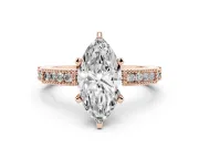 Marquise Cut Diamond Solitaire Ring Set in Rose gold with Slim Pavé Band and Prong Setting