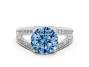 Fancy Blue Round Cut Diamond Split Shank Ring Set in White gold with Pavé Band and Prong Setting