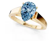 Fancy Blue Pear Cut Diamond Solitaire Engagement Ring Set in Yellow gold with Prong Setting and Tapered Band