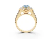 Fancy Blue Oval Cut Diamond Halo Engagement Ring Set in Yellow gold with Split Shank and Prong Setting