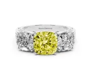 Fancy Yellow Cushion Cut Diamond Three-Stone Ring Set in Silver with Textured Band