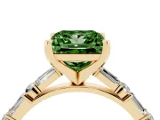 Fancy Green Princess Cut Diamond Solitaire Set in Yellow gold with Side Baguettes and Channel Set Band