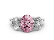 Fancy Pink Oval Cut Diamond Three-Stone Ring Set in White gold with Bold Center and Classic Band