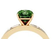 Fancy Green Radiant Cut Diamond Solitaire Ring Set in Yellow gold with Channel-Set Baguette Band and Prong Setting